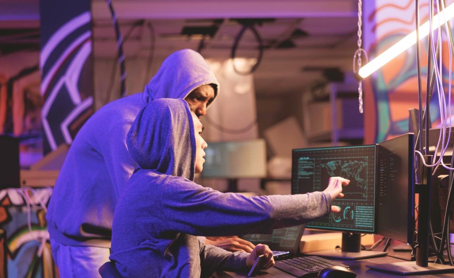 Team collaboration session with whiteboard showing testing workflow diagrams