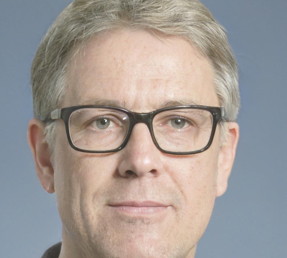 Professional headshot of automation specialist graduate